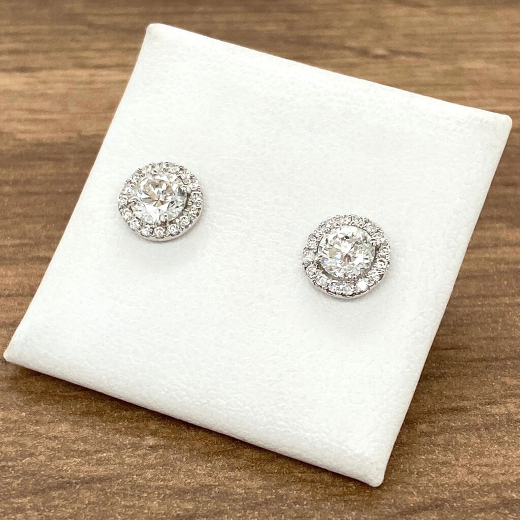 A pair of Diamond Halo Cluster Stud Earrings, 18ct White Gold, 1.25ct.