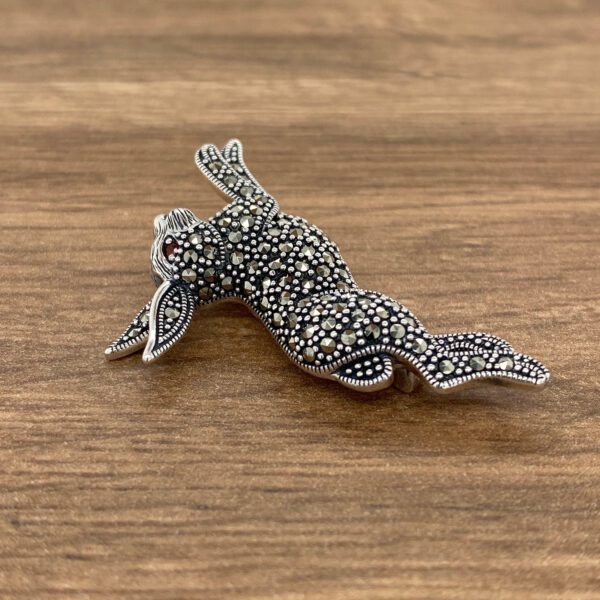 Silver rabbit brooch with marcasite stones.