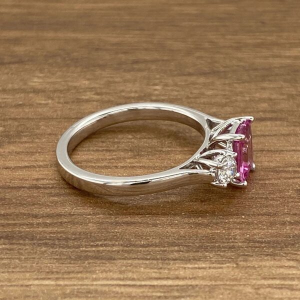 Pink sapphire and diamond engagement ring.