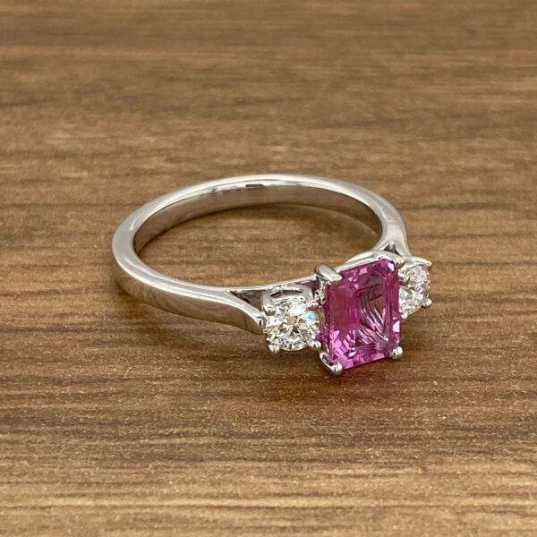 Pink sapphire and diamond engagement ring.