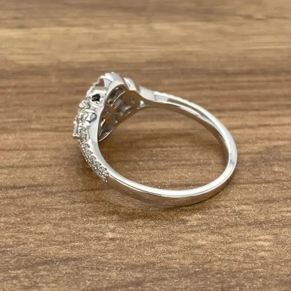 Diamond ring with intricate design.