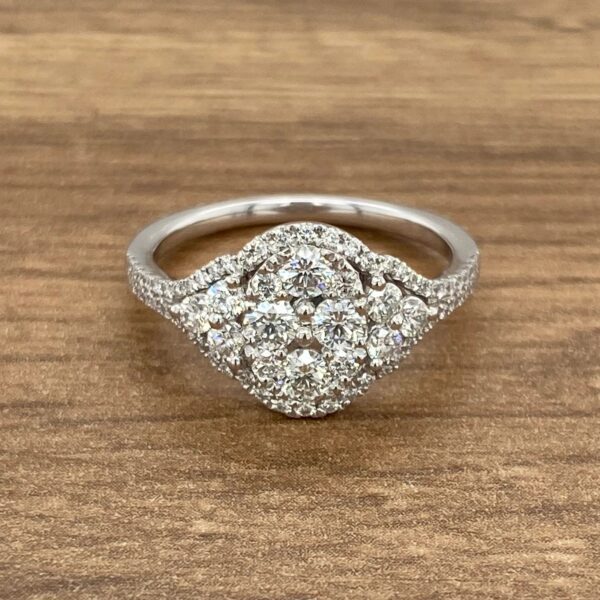 Diamond engagement ring with halo setting.