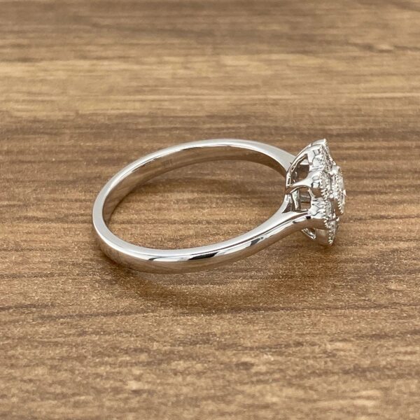 Diamond ring with floral design.