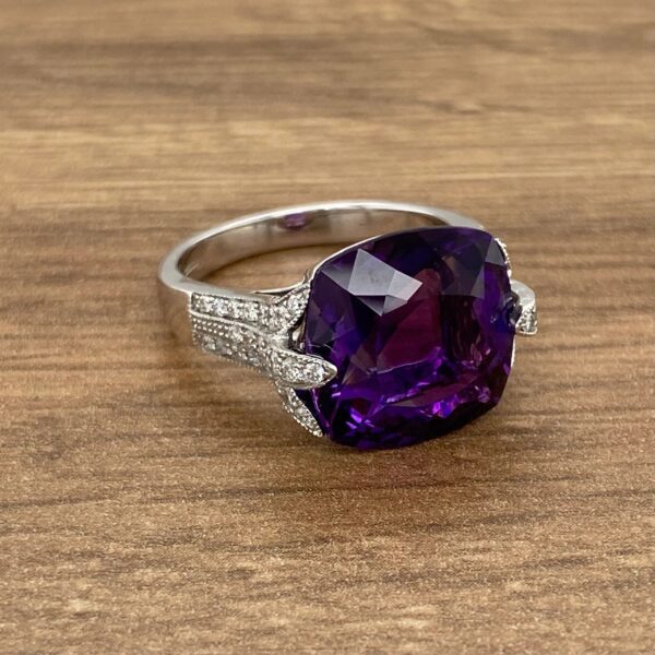 Amethyst ring with diamond accents.