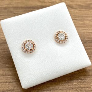 A pair of Aquamarine & Diamond Large Oval Cluster Earrings in rose gold.