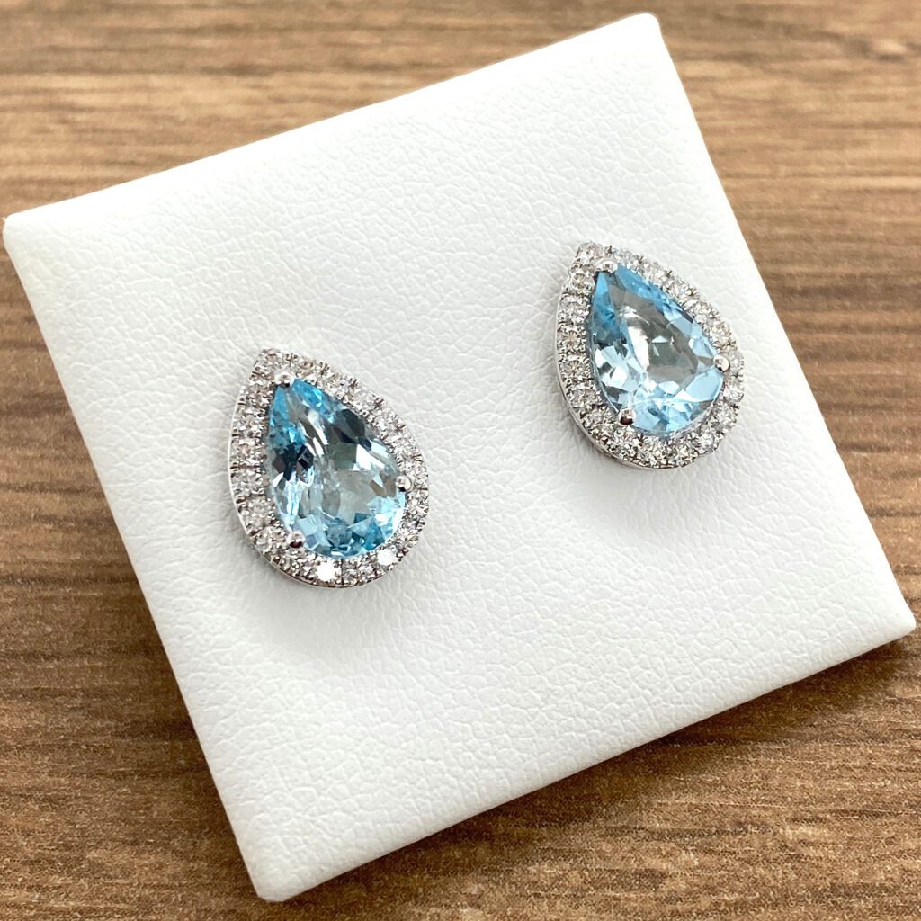 Pair of aquamarine and diamond earrings.