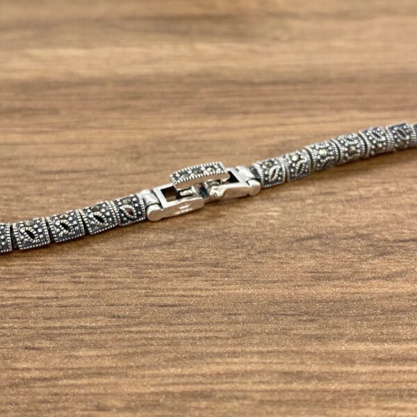 Silver and marcasite bracelet clasp.