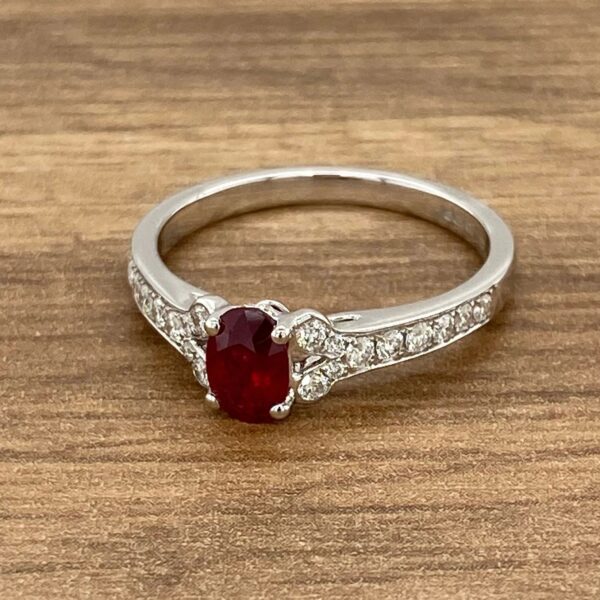 White gold ring with ruby and diamonds.