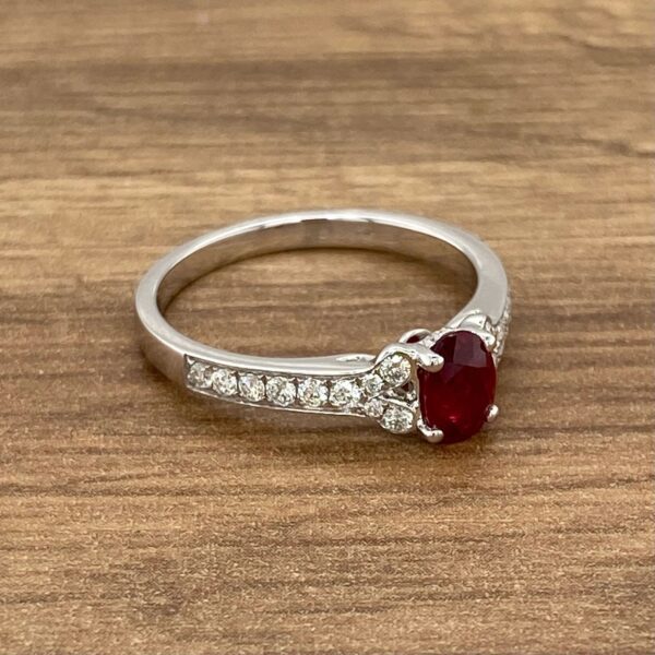 White gold ring with ruby and diamonds.