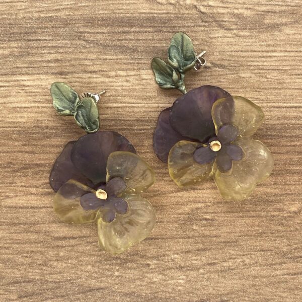 Purple and yellow flower earrings.