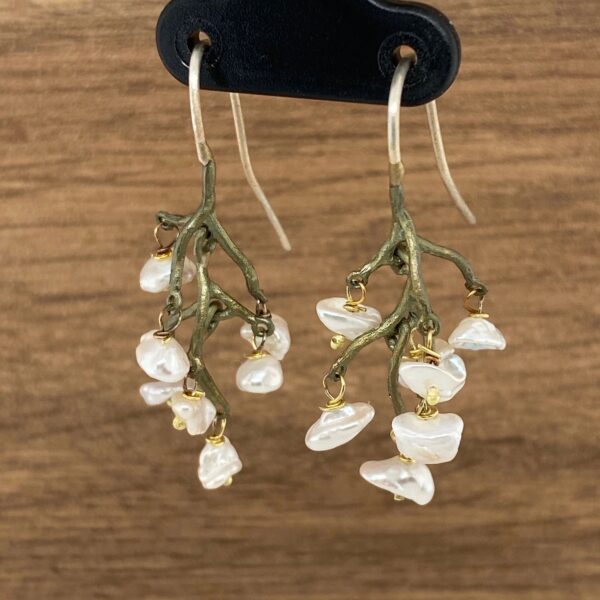 Branch earrings with pearl accents.