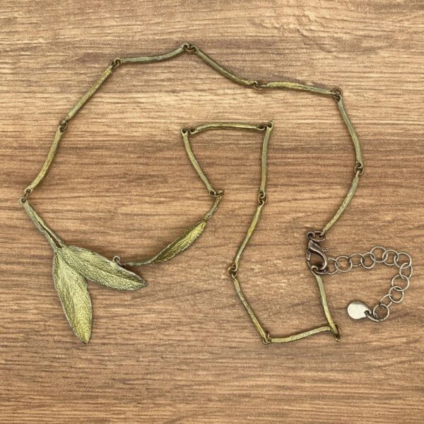 Gold leaf necklace with metal chain.