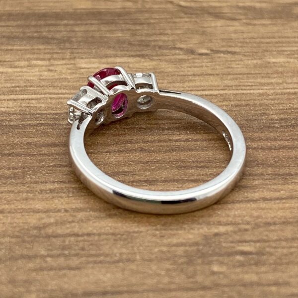 White gold ring with ruby and diamonds.