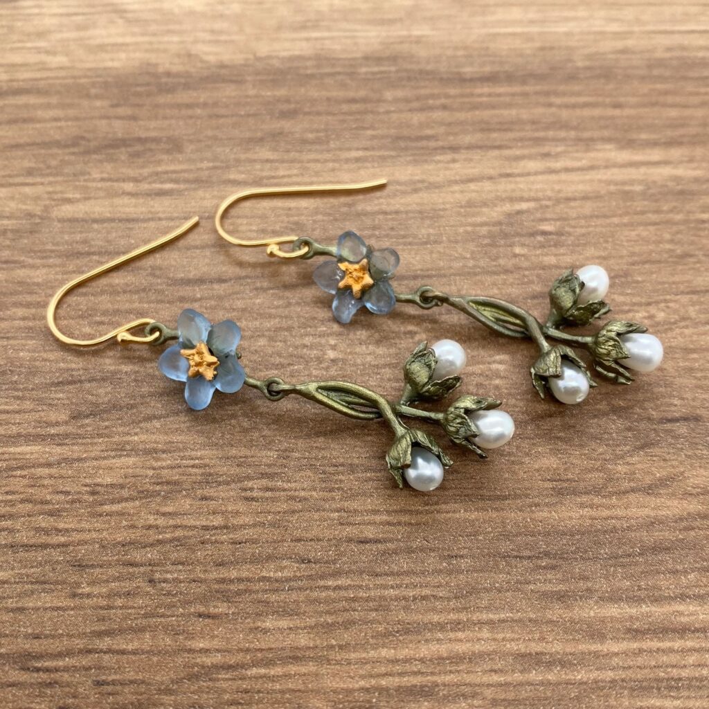 Blue flower and pearl earrings.