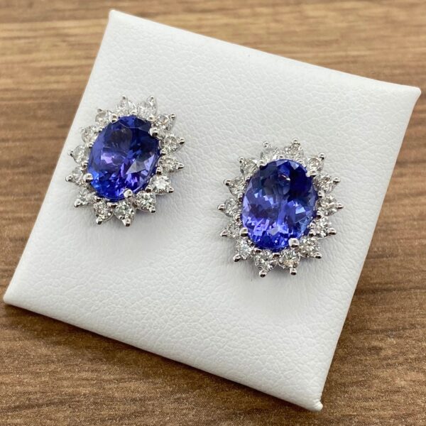 Diamond and sapphire oval earrings.