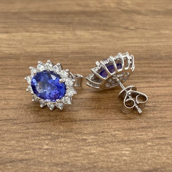 Diamond and sapphire oval earrings.