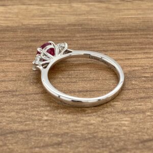 White gold ring with ruby and diamonds.