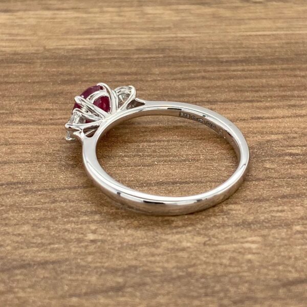 White gold ring with ruby and diamonds.