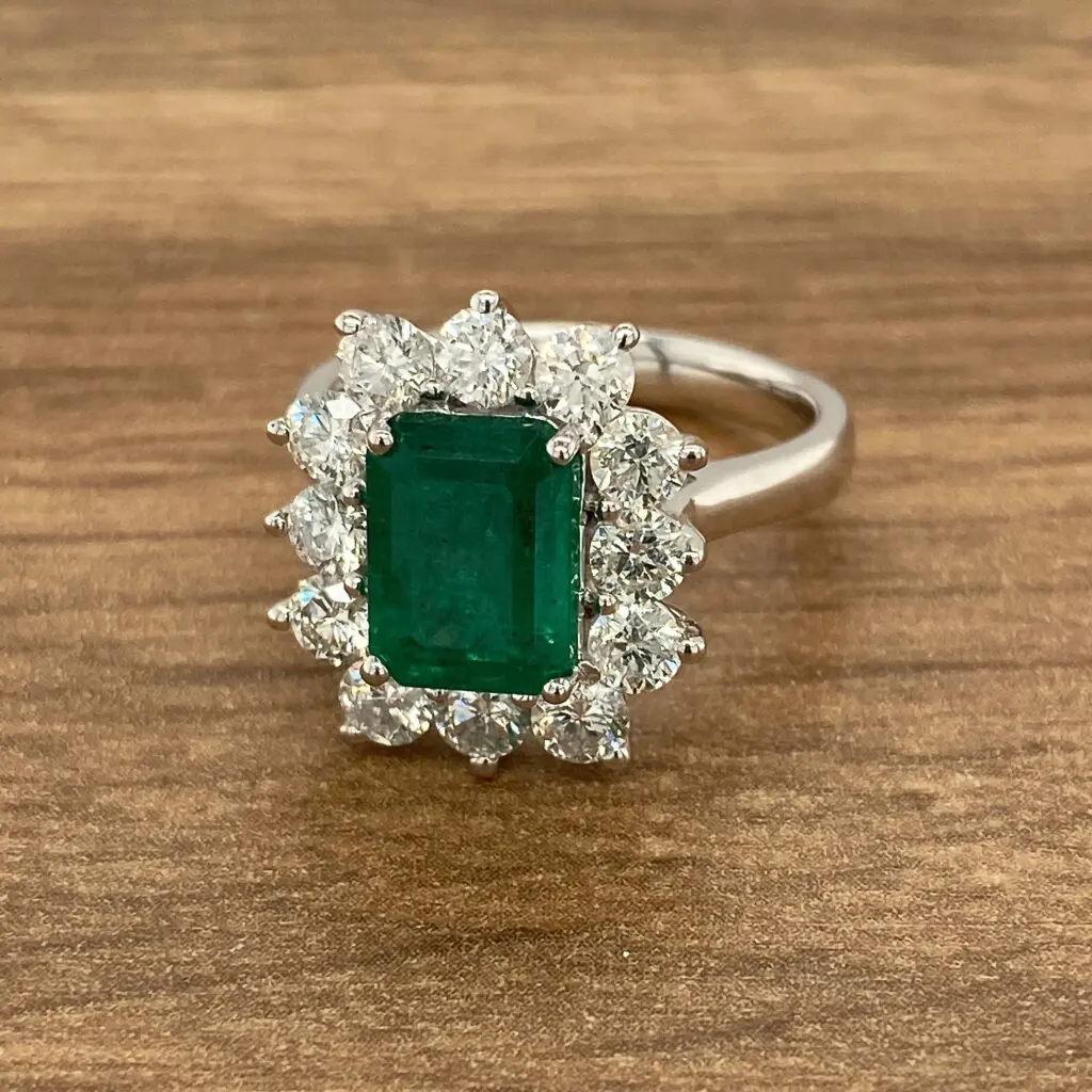 Emerald and diamond engagement ring.