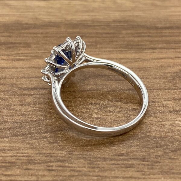 Silver ring with a blue gemstone.