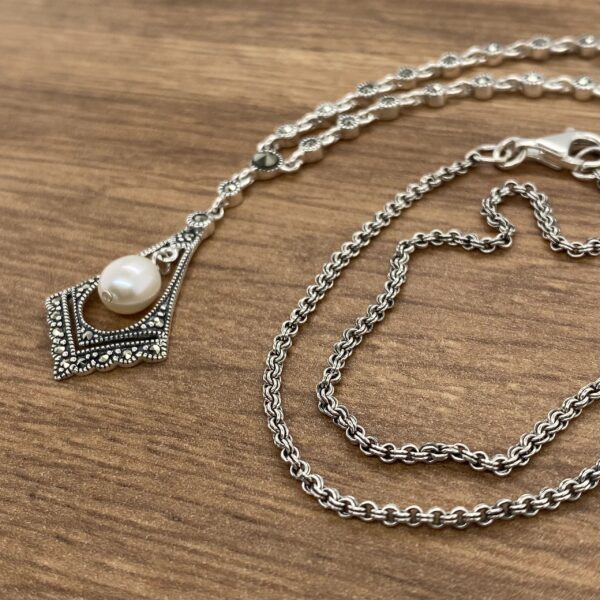 Silver necklace with pearl and marcasite.