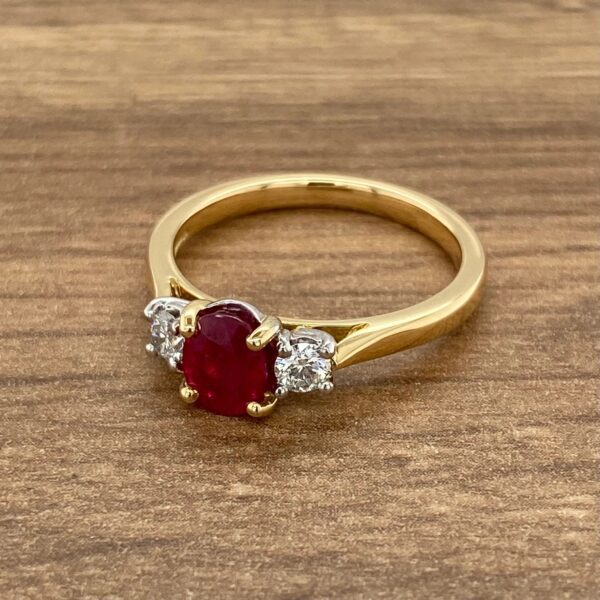 Gold ring with ruby and diamonds.