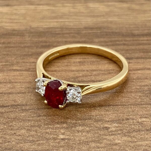 Gold ring with ruby and diamonds.