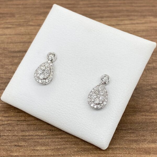 Pair of teardrop diamond earrings.