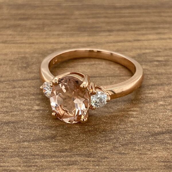 Rose gold ring with morganite and diamonds.