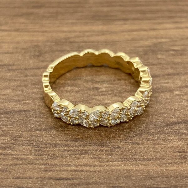 Gold band with marquise diamonds.