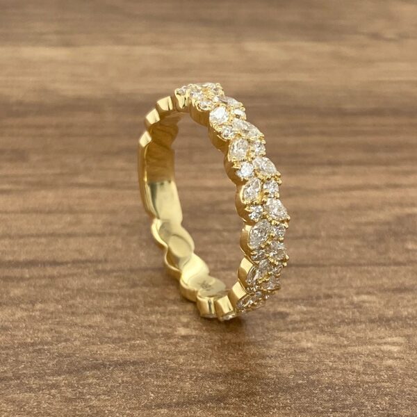 Gold band with pave diamond setting.