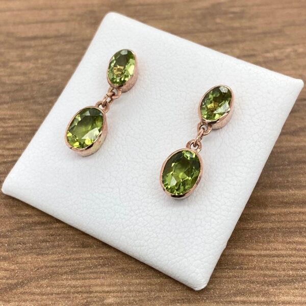 Peridot earrings in rose gold.