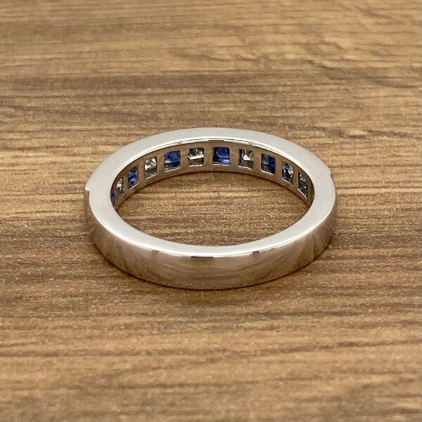 White gold sapphire and diamond band.