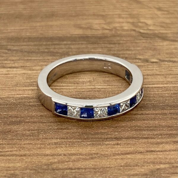 Sapphire and diamond eternity band ring.