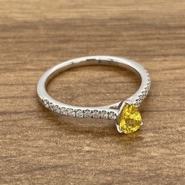 Diamond and yellow sapphire engagement ring.