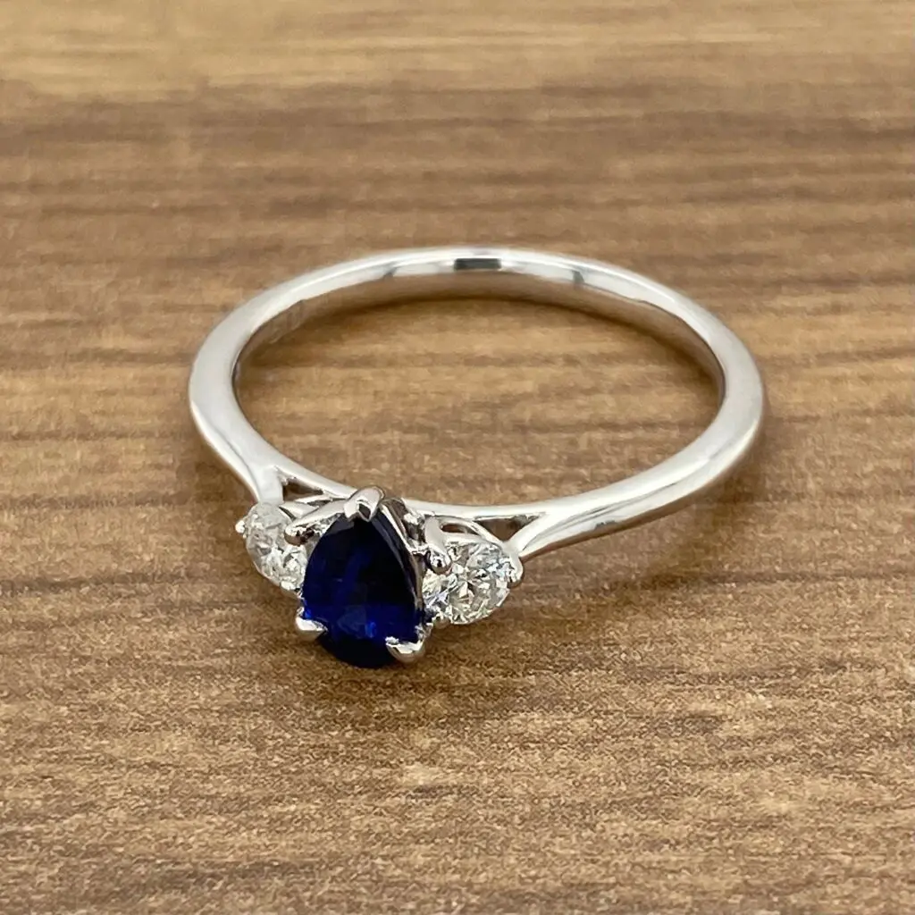 Pear-shaped sapphire and diamond ring.