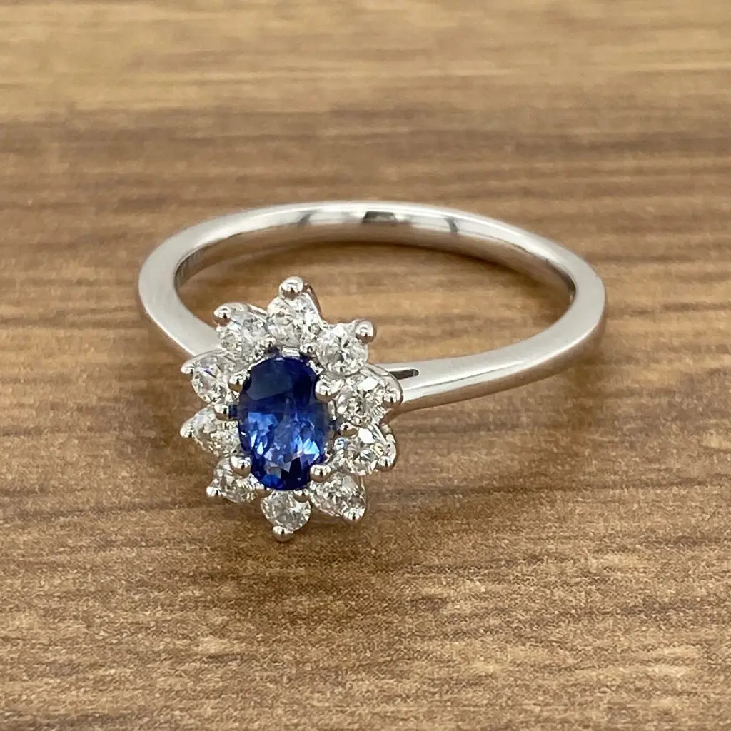 Diamond ring with blue sapphire stone.