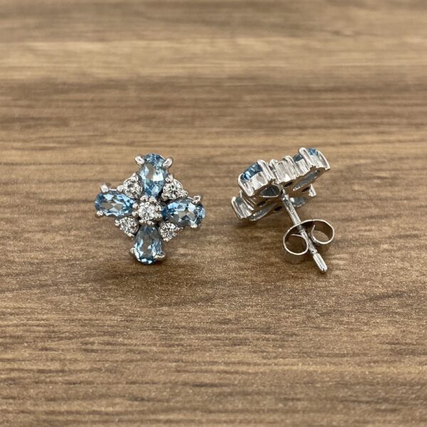 Blue topaz and diamond stud earrings.