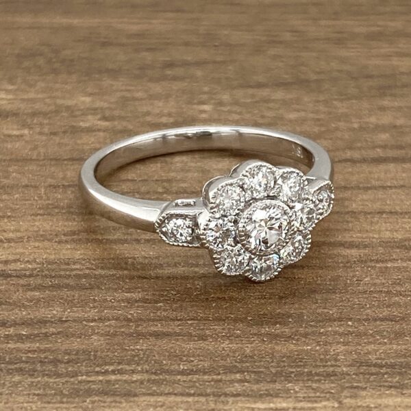 Diamond engagement ring with floral setting.