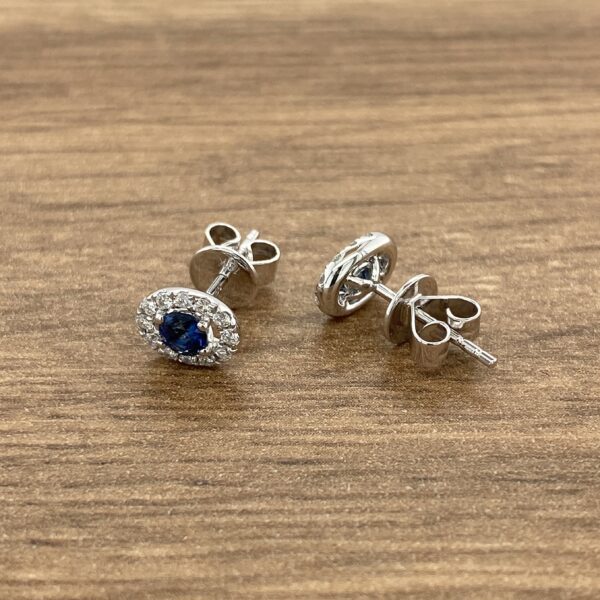 Diamond and sapphire stud earrings.