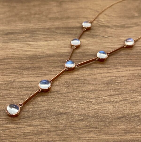 Moonstone lariat necklace in rose gold.