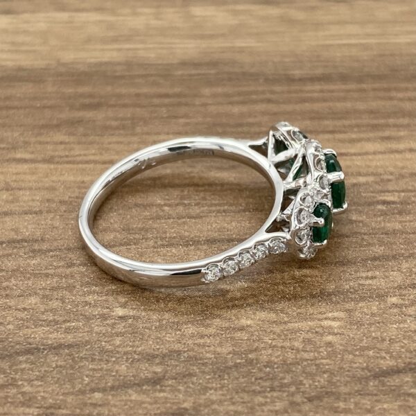 Emerald and diamond engagement ring.