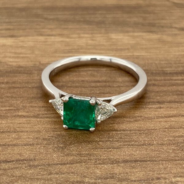 Emerald and diamond engagement ring.