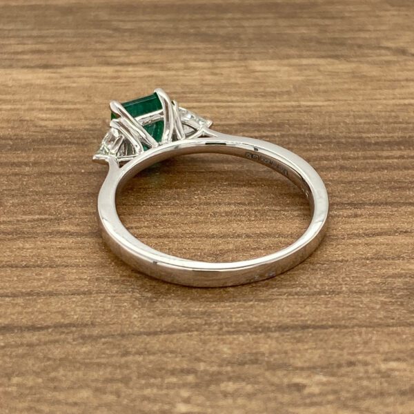 Emerald and diamond engagement ring.