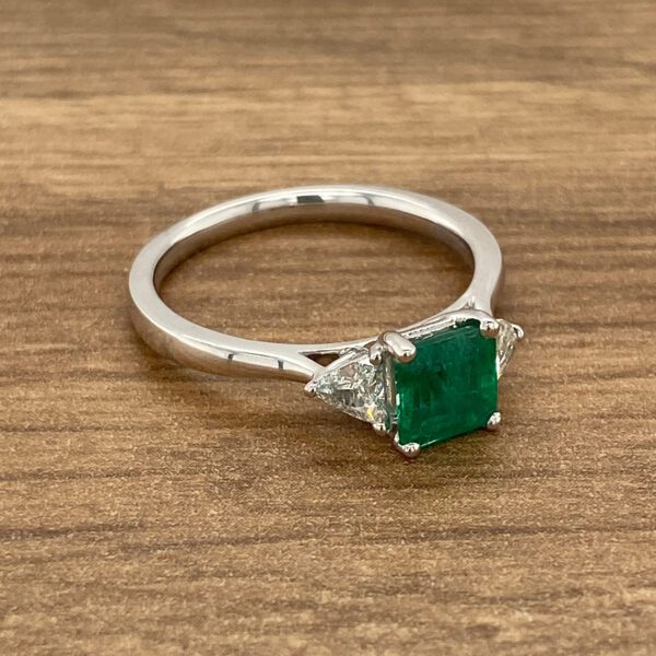 Emerald and diamond engagement ring.