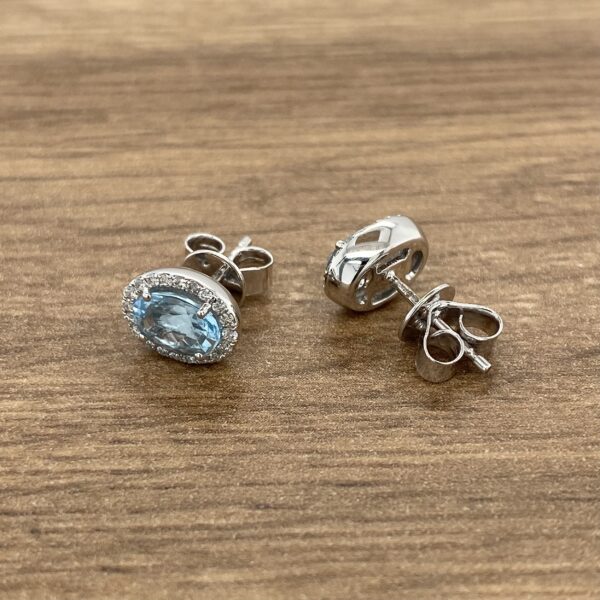 Diamond and aquamarine stud earrings.