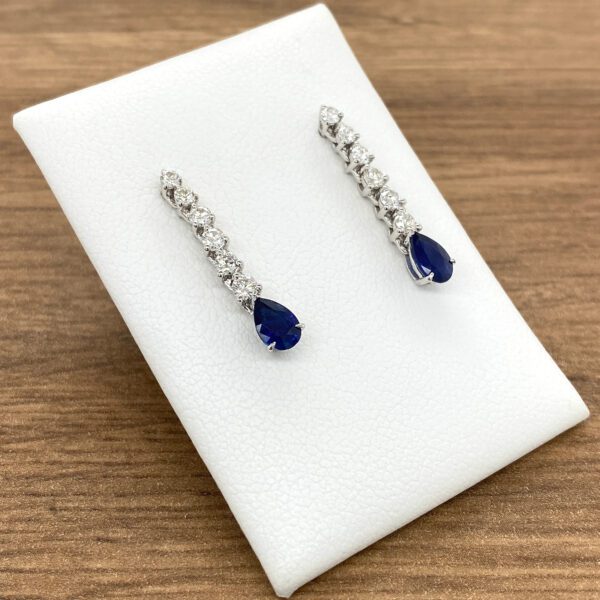 Diamond and sapphire drop earrings.