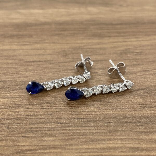 Diamond and sapphire drop earrings.