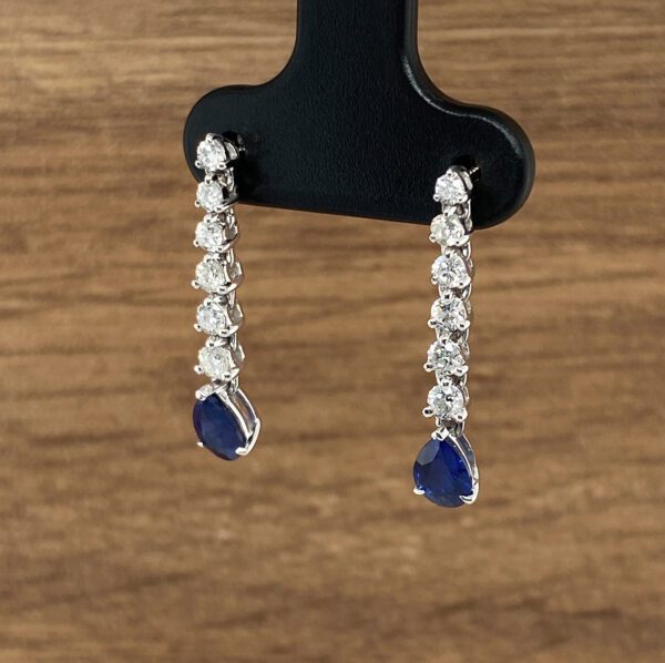 Pair of sapphire and diamond earrings.