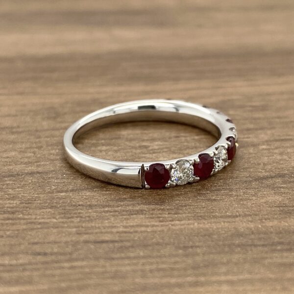 White gold ring with ruby and diamond stones.